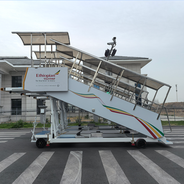 Camion d'escalier pour passagers remorquable